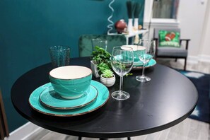 Gather around the table and share moments that matter. The dining area blends elegance and warmth