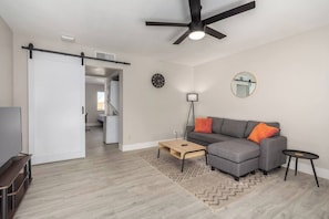 Gather around the fireplace, play board games, or watch a movie – our living room is the heart of the home.