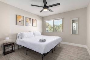 Experience the ultimate in relaxation in our stylish and serene bedroom.