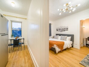 Spacious and Modern, a perfect space for you to breath and relax! #HomelySpace #CozyBed