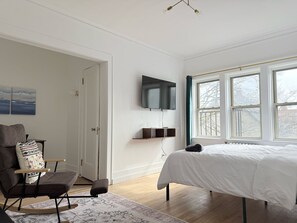 Bright & Airy – Large windows bring in natural light.