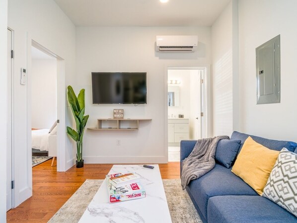 Enjoy a cinematic experience in the comfort of our property, with a TV offering a variety of streaming options for your entertainment pleasure. #Relax #UnwindYourDay #Tv #Shower #Netflix