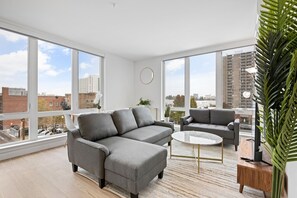 Kick back and enjoy your favorite programs in our comfortable living room, designed for ultimate relaxation.