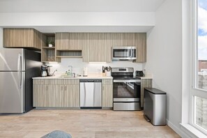 Explore your culinary creativity in our modern kitchen, equipped with all the tools you need for a delightful cooking experience.