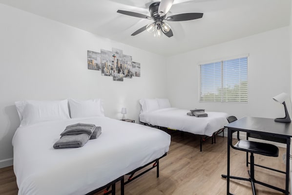 Step into comfort and tranquility. This cozy bedroom offers a plush bed, soft linens, and a serene ambiance