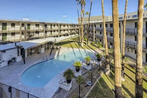 Relax poolside. This space is shared with other guests and residents. Gated area, key is provided in the unit. 