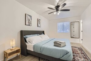 Master bedroom with en suite private master full bath. Sleep like a baby on the memory foam king mattress. Bedside touch lamps with usb charging ports on each side. 