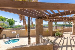 Unwind and relax in the shared hot tub.