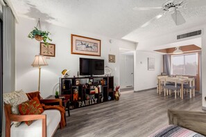 Kick back and unwind in the cozy living room, perfect for relaxing after a day of adventures.