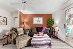 Kick back and unwind in the cozy living room, perfect for relaxing after a day of adventures.