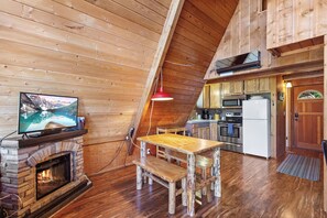 The dining area is adjacent to the kitchen