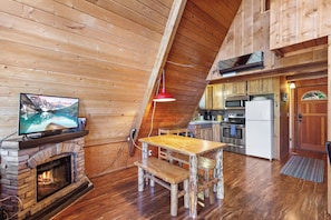 The dining area is adjacent to the kitchen