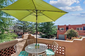 Lounge the day away with a refreshing beverage on one of two private balconies