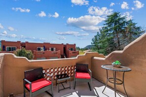 Lounge the day away with a refreshing beverage on one of two private balconies