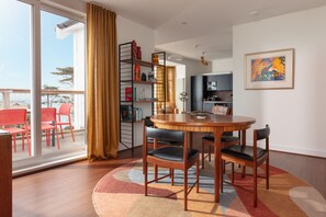 Dining room looking out to private balcony and sea views