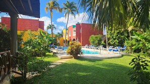 Explore the "garden oasis" and its mature landscaping w/ paths and shaded areas.
