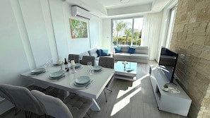 Dining Room area with living room and pool view