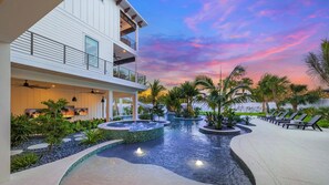 Twilight - Sunken Living Area - Screened in Patio - 2nd Level Waterslide, Spa, and Rain Curtain
