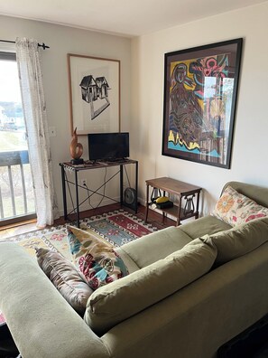 Quiet upstairs den is a perfect retreat with views of Block Island