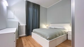 Modern bedroom with walk-in closet