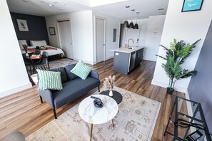 Step into our apartment, where the living space seamlessly transitions into an open kitchen and dining area. The airy layout fosters a sense of spaciousness and connectivity, creating an inviting ambiance for relaxation, culinary adventures, and shared meals with loved ones.