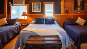 Bedroom # 1 : Master bedroom , ( 3 double beds ) private bathroom, , ceiling fan , tv , fireplace, window ac