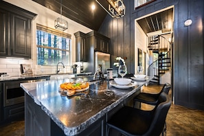 Full kitchen with island seating
