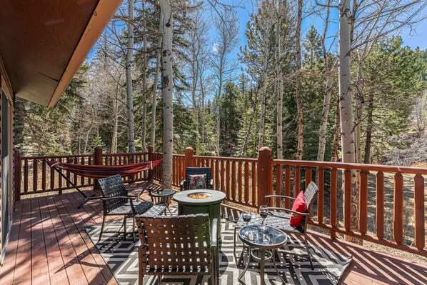 After a long hike, find solace on the deck. Put your feet up and relax by the warm fire.