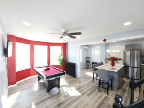 Pool Table and newly updated Kitchen with island, perfect for enjoying a fun time! 