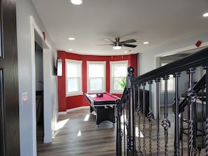Entrance into the property to the pool table area and kitchen 