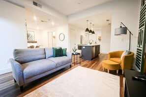 Delight your senses with the lively and colorful atmosphere of our living room, crafting a dynamic area for unwinding and mingling. #LivelyVibes #SophisticatedSpace
