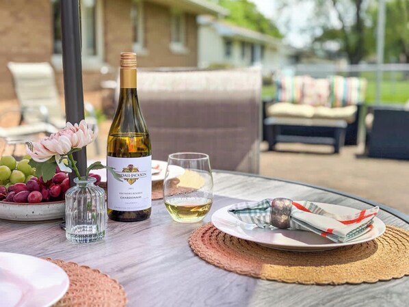 Close-up of the outdoor dining table, perfect for relaxed outdoor gatherings or morning coffee al fresco.