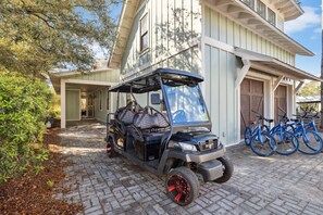 Zip to the pool and beach on our golf cart!