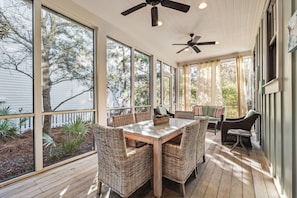 Enjoy a meal on the screened in porch!