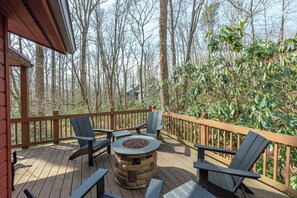 Open-air deck with gas fire table and seating