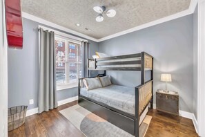 Welcome to your chic Nashville retreat! This stylish bunk bedroom is perfect for large groups or family reunions. Enjoy comfort and modern vibes as you explore Music City. Your adventure starts here!