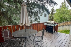 Fire up the grill! This outdoor space is perfect for enjoying summer evening with friends.
