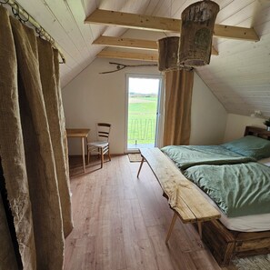 Schlafzimmer mit Balkon