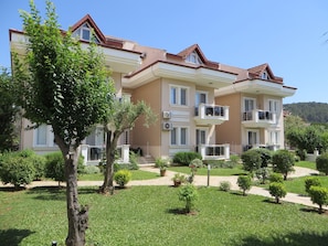 The apartment (top middle) and gardens.