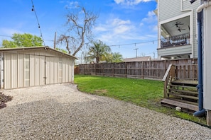 Spacious backyard for your furry friends!