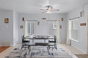 Charming dining table that sits 6 with full tableware and silverware included.