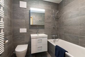 Modern Bathroom with bath 