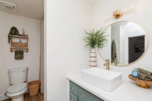 Ensuite bathroom with shower and tub combo