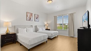 Modern bedroom with en-suite, 2 double beds and a smart TV