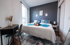 Step into comfort and tranquility. This cozy bedroom offers a plush bed, soft linens, and a serene ambiance 
