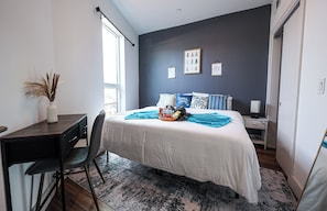 Step into comfort and tranquility. This cozy bedroom offers a plush bed, soft linens, and a serene ambiance