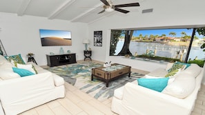 Bright modern living room with a dream view of the canal