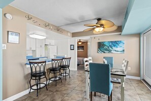 The Kitchen features a Breakfast Bar, perfect for grabbing a quick bite before hitting the Beach.