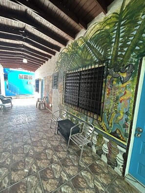 Guesthouse courtyard outside your room.