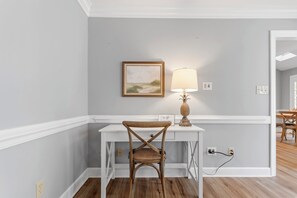 View of the downstairs work from home area.  This home has two desks.